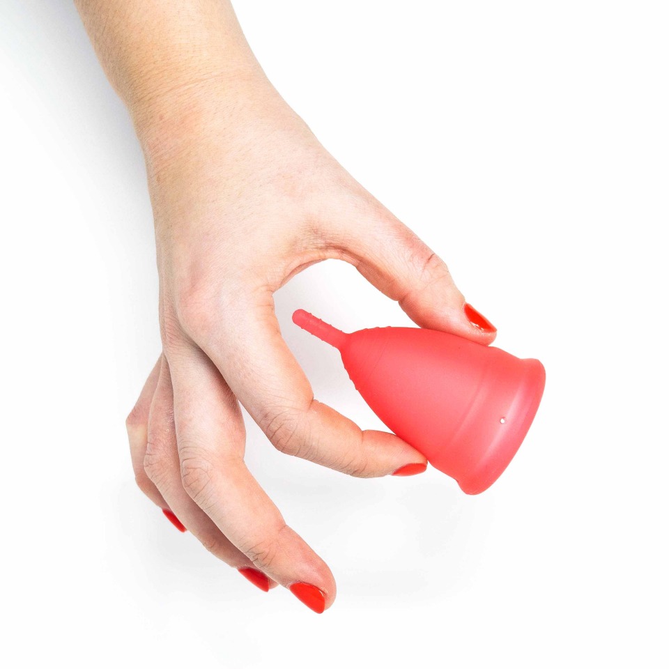 Hey Girls - hand holding Menstrual Cup