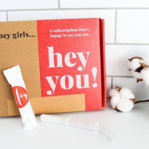 box of plant regular based tampons with a cotton branch beside it
