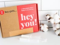 box of plant based tampons with a cotton branch beside it