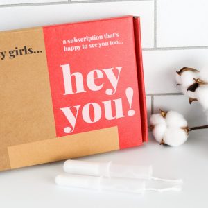 box of plant based tampons with a cotton branch beside it